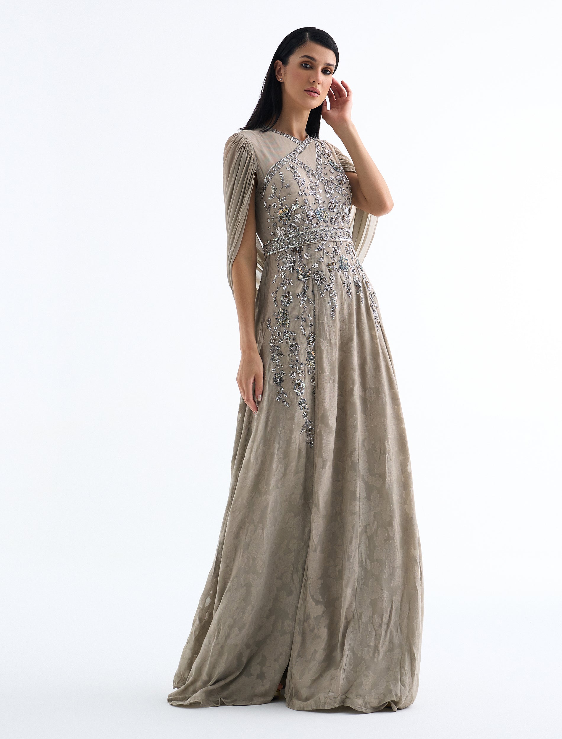 The Gray Brown Evening dress for special occasions features floral embroidery and a chiffon cape. The Gray Brown Evening dress for special occasions features floral embroidery and a chiffon cape.