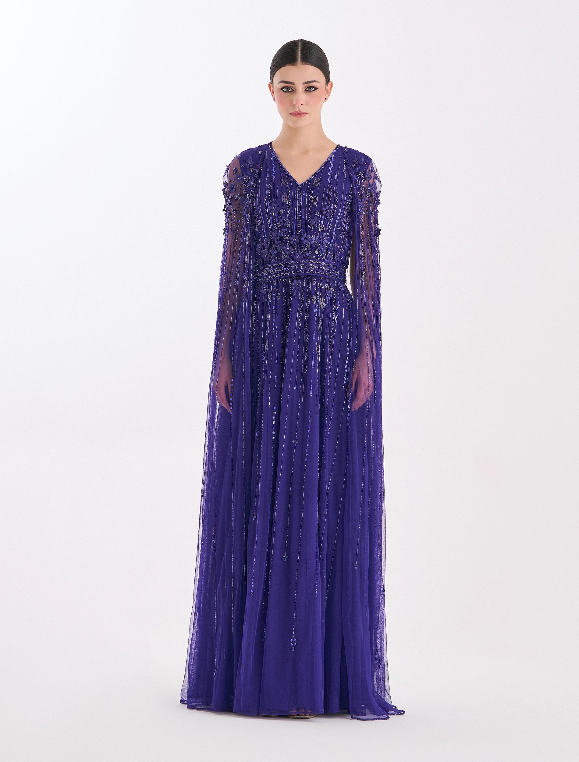 Dark purple dress with long cape and embroidery