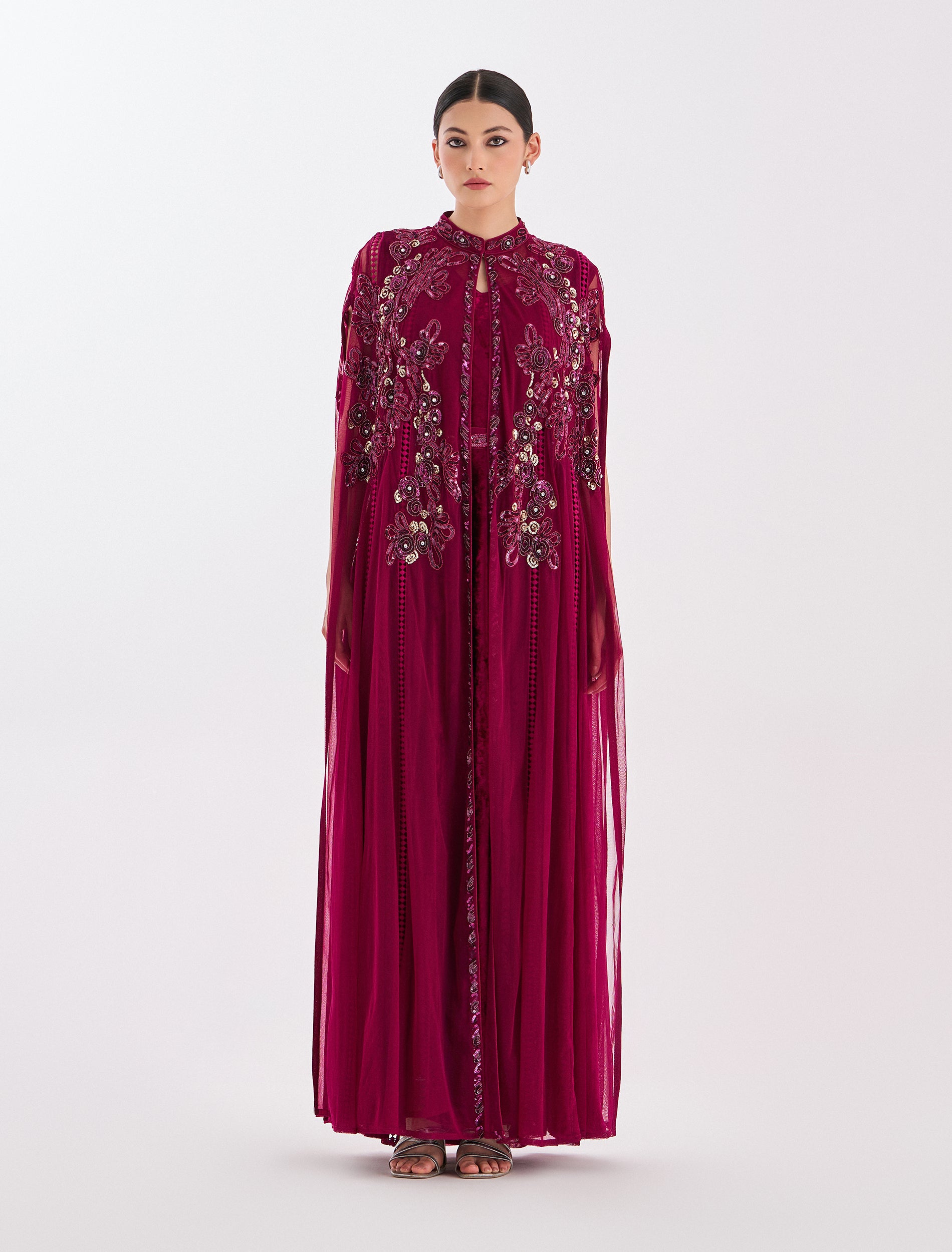 Floral dress in fuchsia with long cape sleeves Floral dress in fuchsia with long cape sleeves