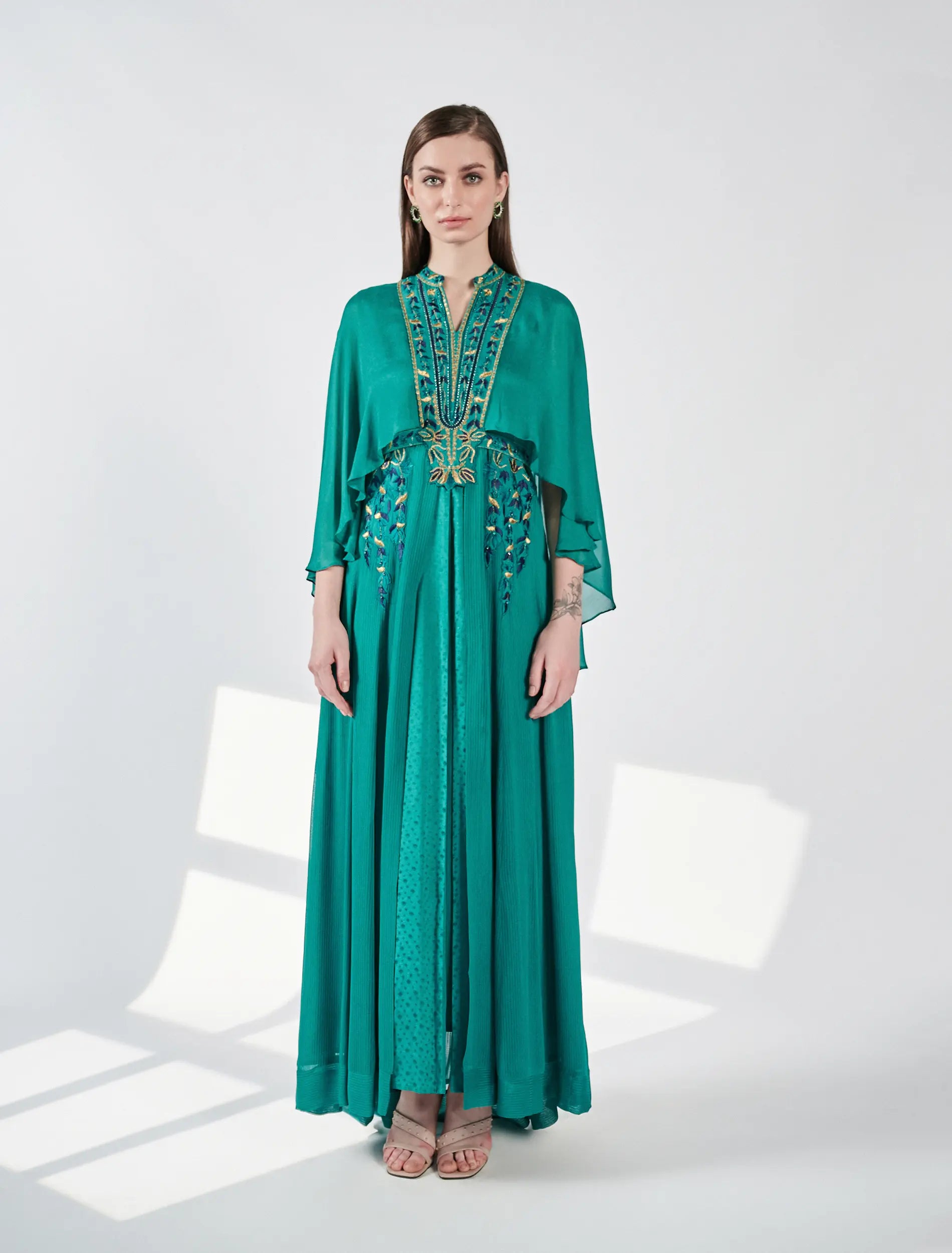 Buy Now: Turquoise Dress with Hand Embroidery in Gold Buy Now: Turquoise Dress with Hand Embroidery in Gold