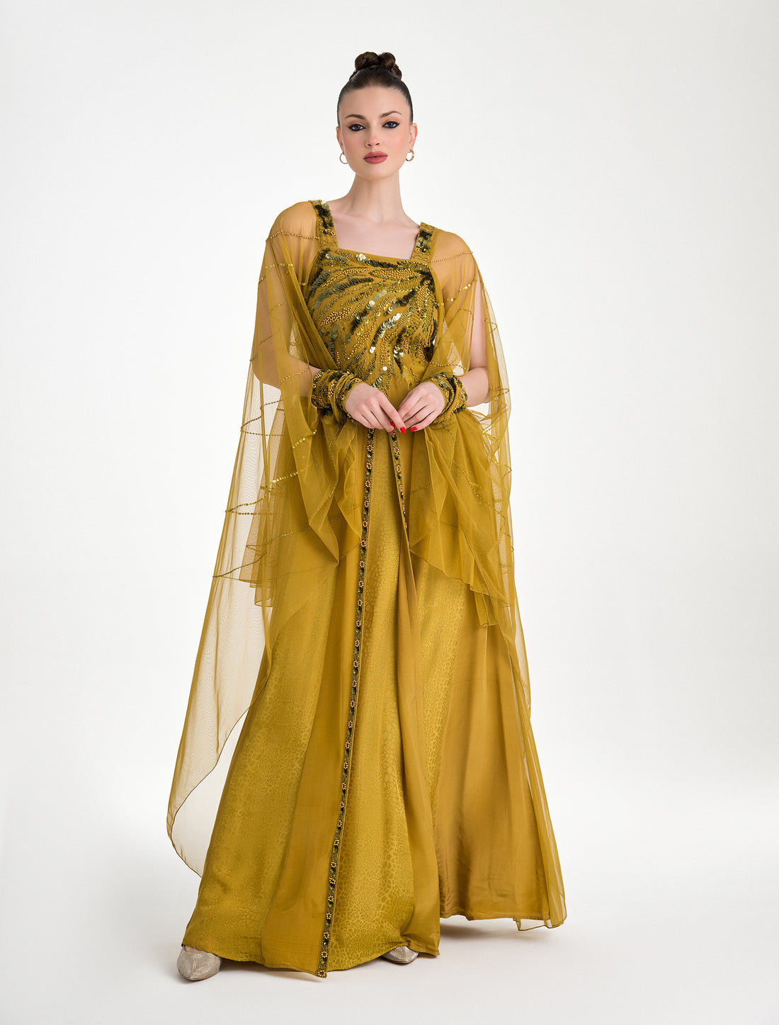 فستان اصفر كموني سهرة بأكمام مفتوحة
Mustard yellow evening dress with long cape sleeves