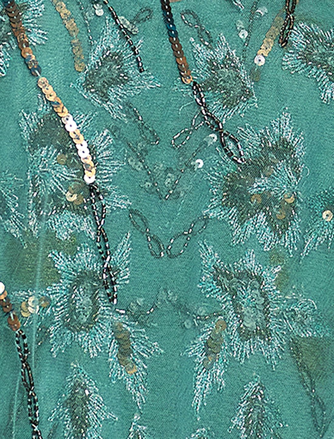 فستان لون فيروزي بتطريزات ذهبية دائرية
Turquoise evening dress with gold and silver hand embroidery