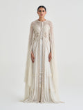  فستان انيق طويل مع كاب مطرز بتطريز ذهبي
Long white dress with gold embroidered cape