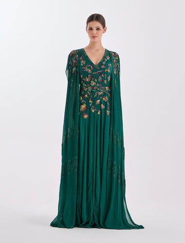 فستان سهرة لون اخضر طويل بتفاصيل راقية