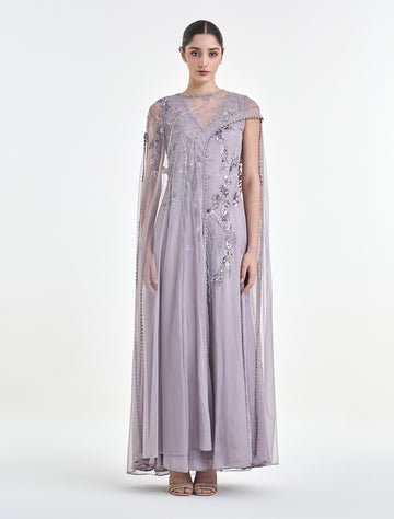 An evening dress with delicate details and a smooth cut