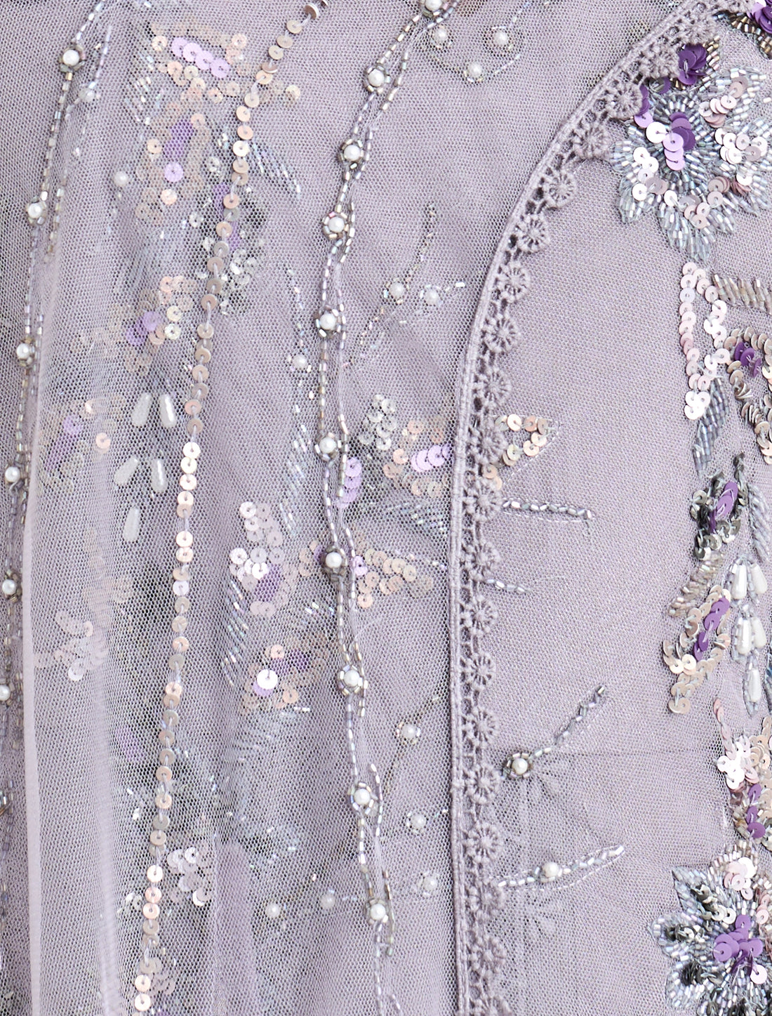 An evening dress with delicate details and a smooth cut