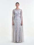 فستان كم طويل مفتوح بلون أبيض أنيق
Long-sleeve evening dress in white