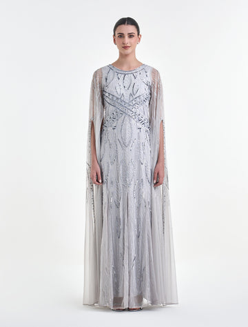 فستان كم طويل مفتوح بلون أبيض أنيق
Long-sleeve evening dress in white