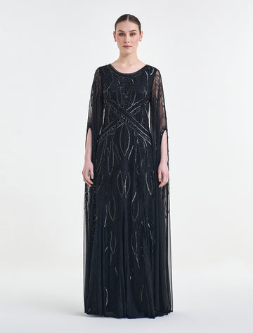 فستان ناعم سهرة أسود أنيق بأكمام كاب مفتوحة لامعة
Elegant black dress for evenings with shimmering open cape sleeves