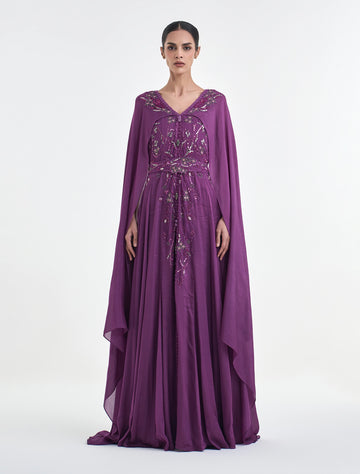 فستان سهرة موف غامق مع كاب من التول الفاخر
purple long-sleeve dress with tulle cape