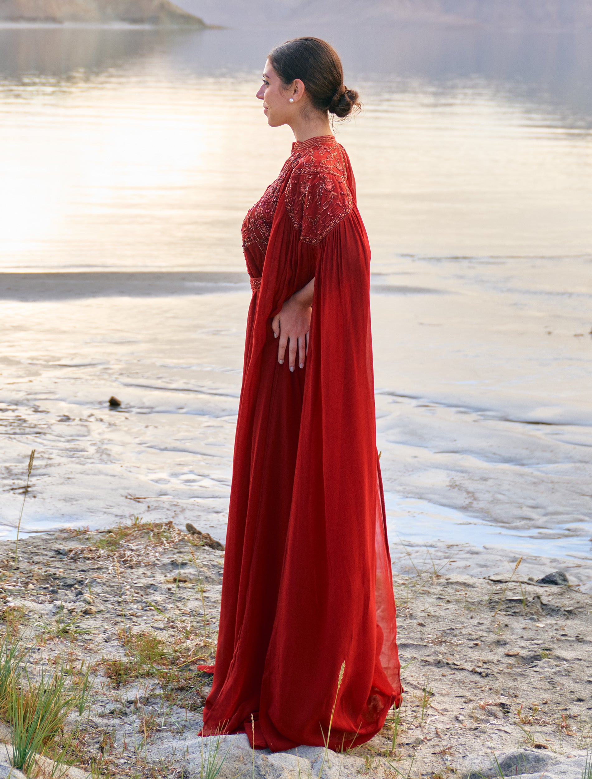 The luxury burgundy evening dress, Hand Embroidered Dress with Long Cape Sleeves. The luxury burgundy evening dress, Hand Embroidered Dress with Long Cape Sleeves.