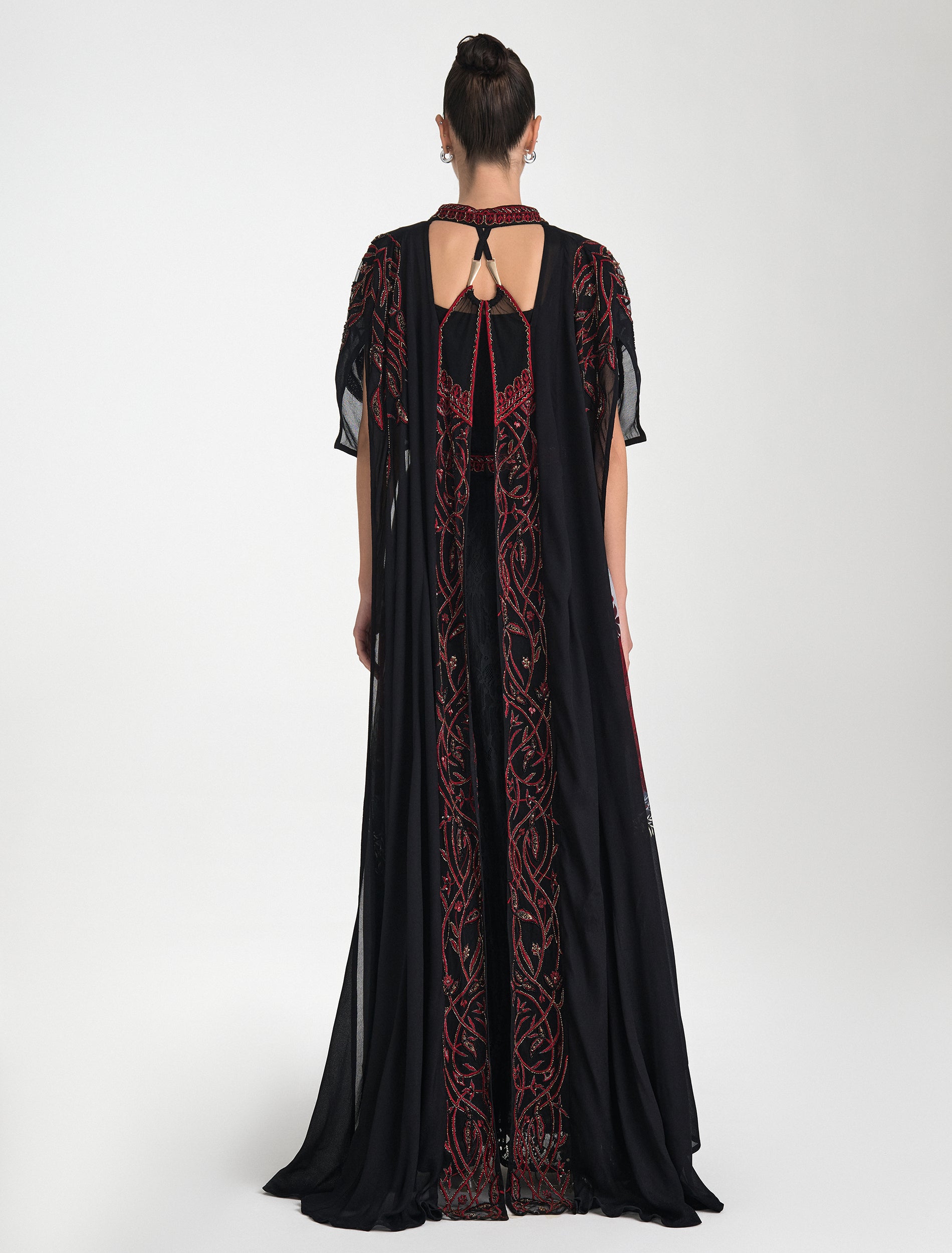 Shop Now: Long Embroidered Evening Dress with Red Embroidery and Luxurious Middle Eastern Details! Shop Now: Long Embroidered Evening Dress with Red Embroidery and Luxurious Middle Eastern Details!