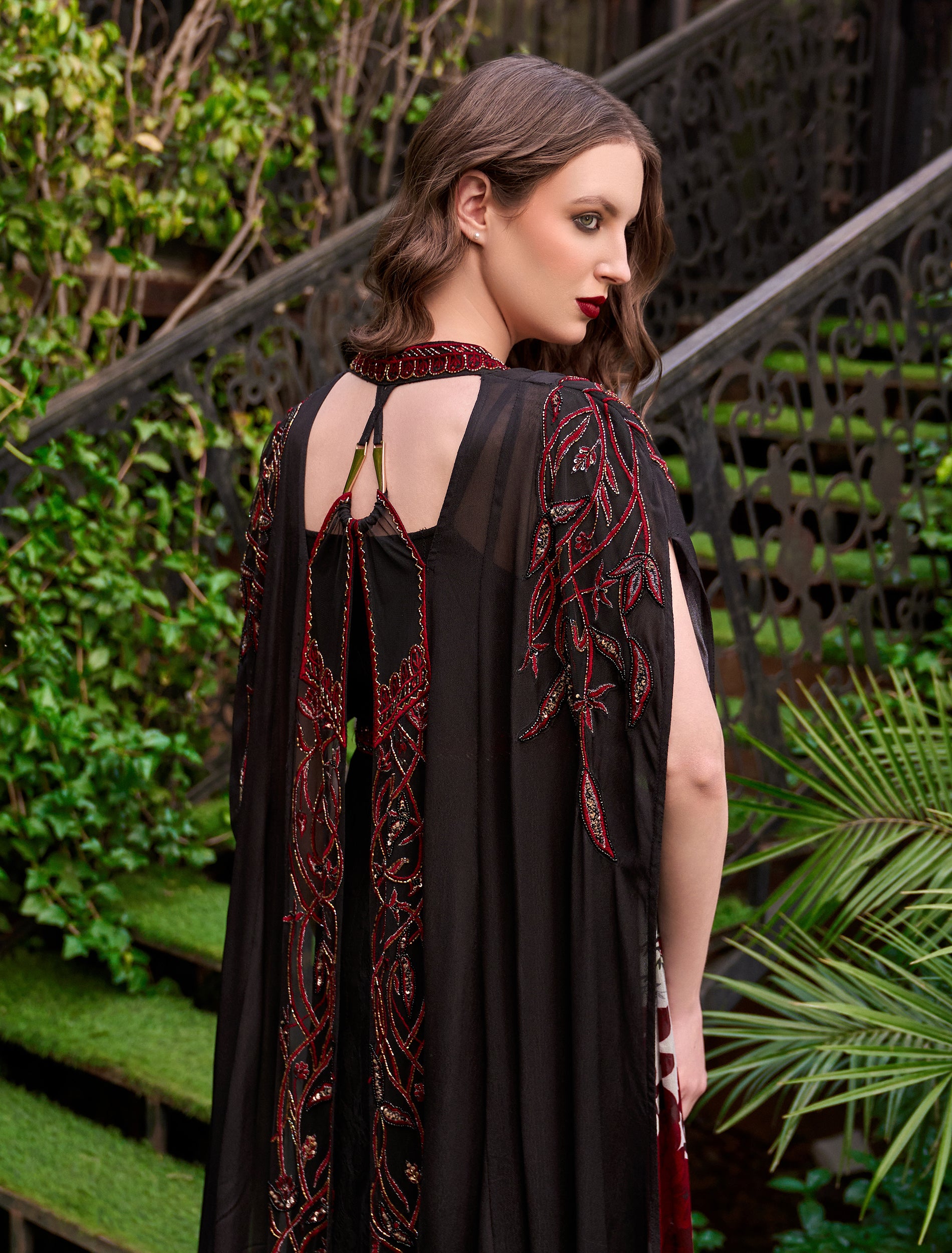 Shop Now: Long Embroidered Evening Dress with Red Embroidery and Luxurious Middle Eastern Details! Shop Now: Long Embroidered Evening Dress with Red Embroidery and Luxurious Middle Eastern Details!