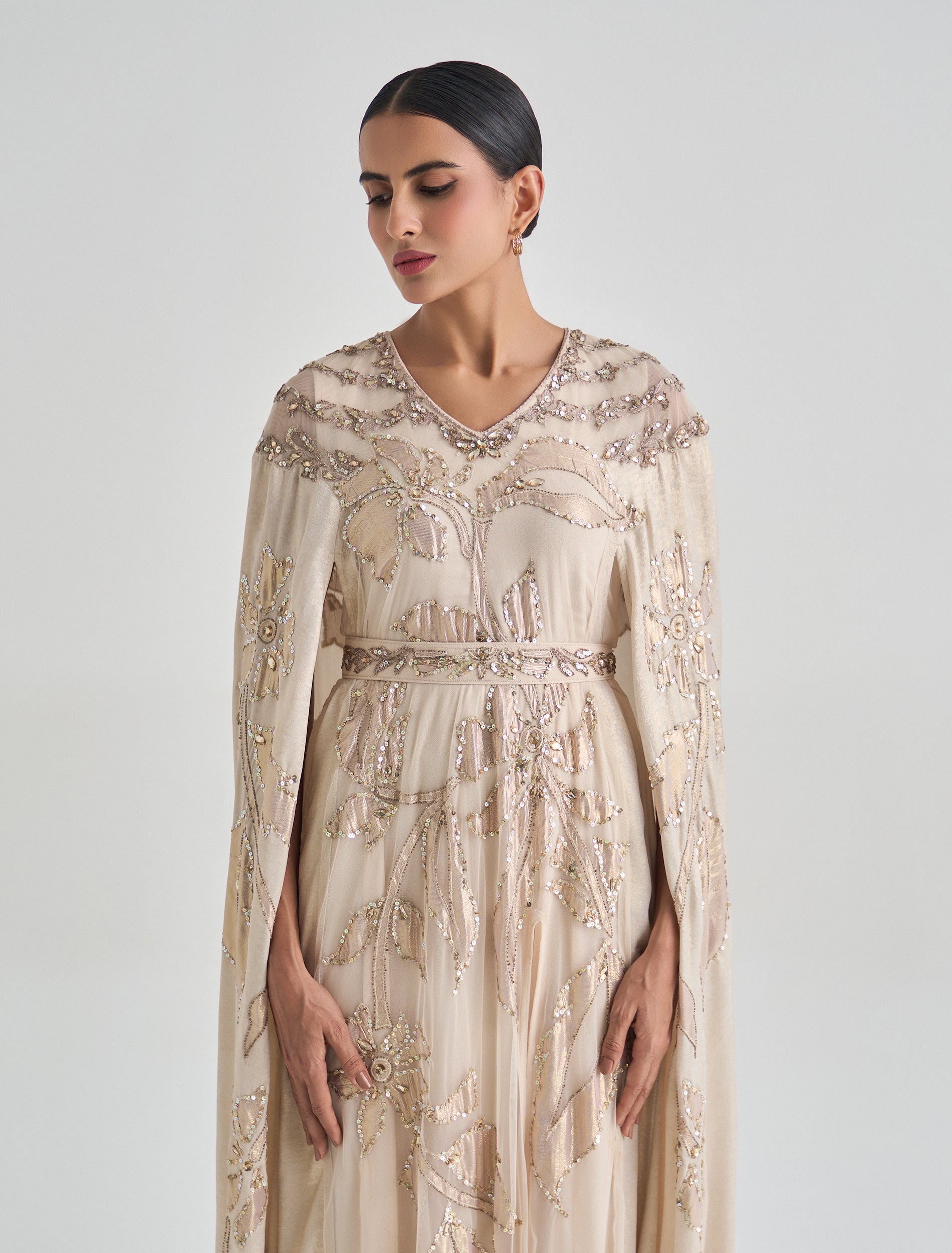Beige color dress with cape and floral embroidery Beige color dress with cape and floral embroidery