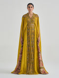 فستان كموني غامق طويل من أرقى موديلات فساتين شتاء 2025
Mustard yellow dress among the elegant 2025 winter dresses