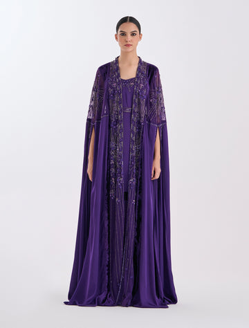 Evening dress with a flowing silhouette and embroidered details