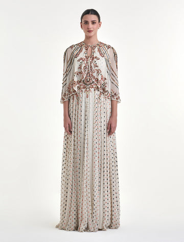 فستان منقط طويل مع بوليرو قصير
Polka dot dress with a short bolero