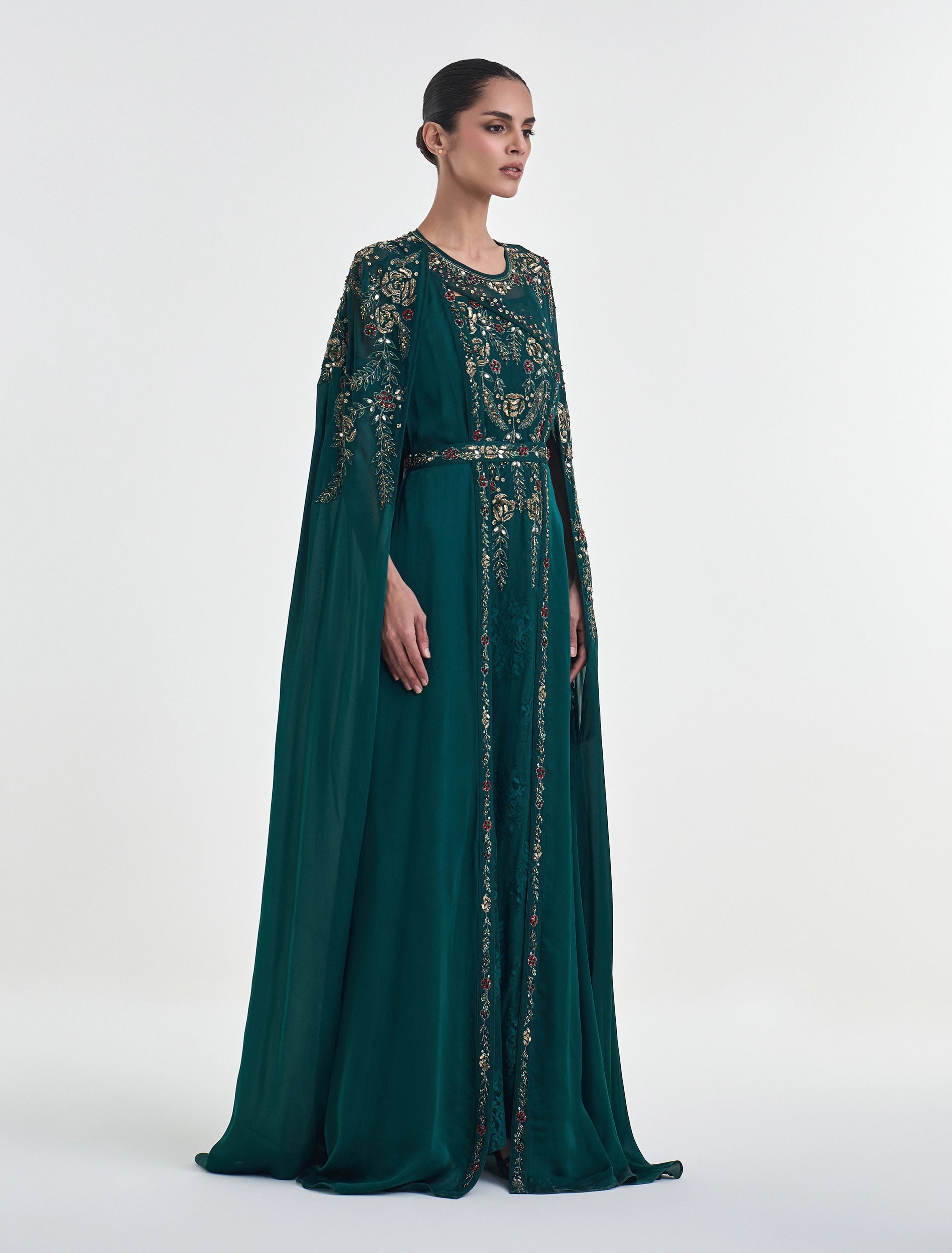 فستان سهرة أخضر غامق ملكي من أزياء شالكي الفاخرة.