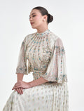 فستان سهرة سكري بأكمام قصيرة مطرزة
cream dress with embroidered short sleeves