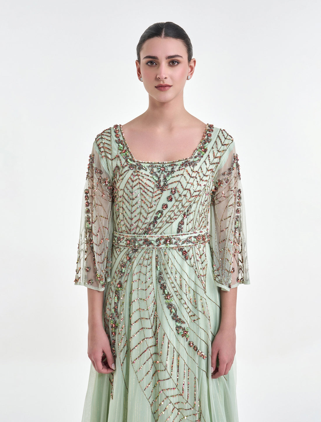 موديل فستان سهرة اخضر فاتح أنيق بتطريز يدوي ملون 
Light green dress with vibrant hand embroidery