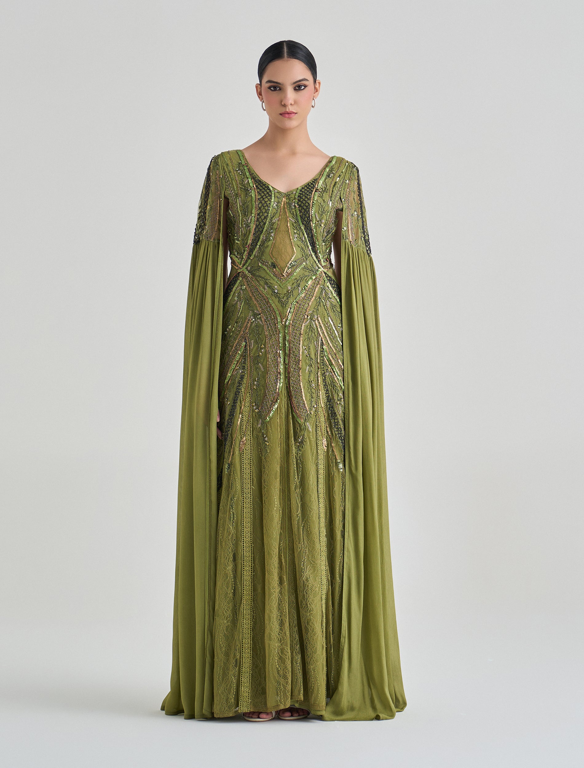 فستان حفلات بلون زيتي من أحدث فساتين سهرة ناعمة