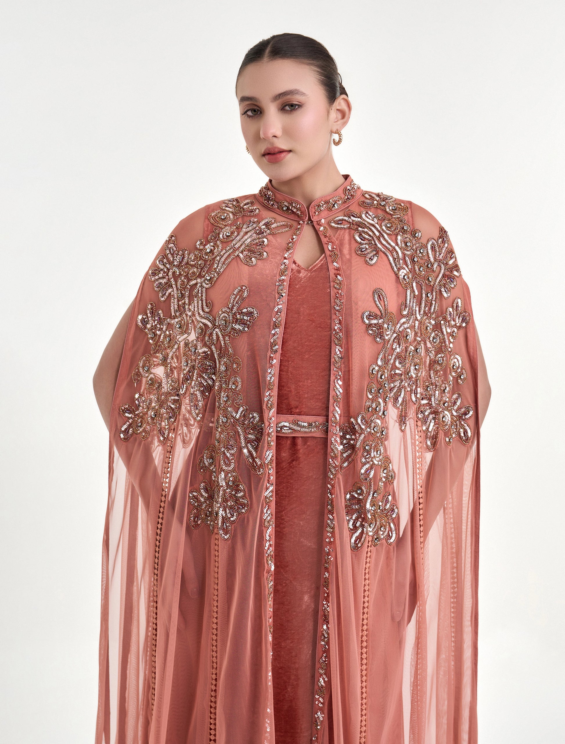 ستايل سهرات مع كاب مميز مطرز
Evening dress with a long, sheer cape