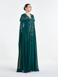 فستان سهرة اخضر بأكمام كاب متدلية
Green dres with cape sleeves for evenings