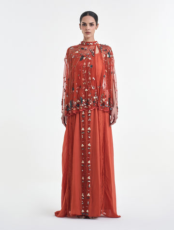 فستان لون برتقالي فاخر بتطريز يدوي لامع
orange dress with shimmering hand embroidery