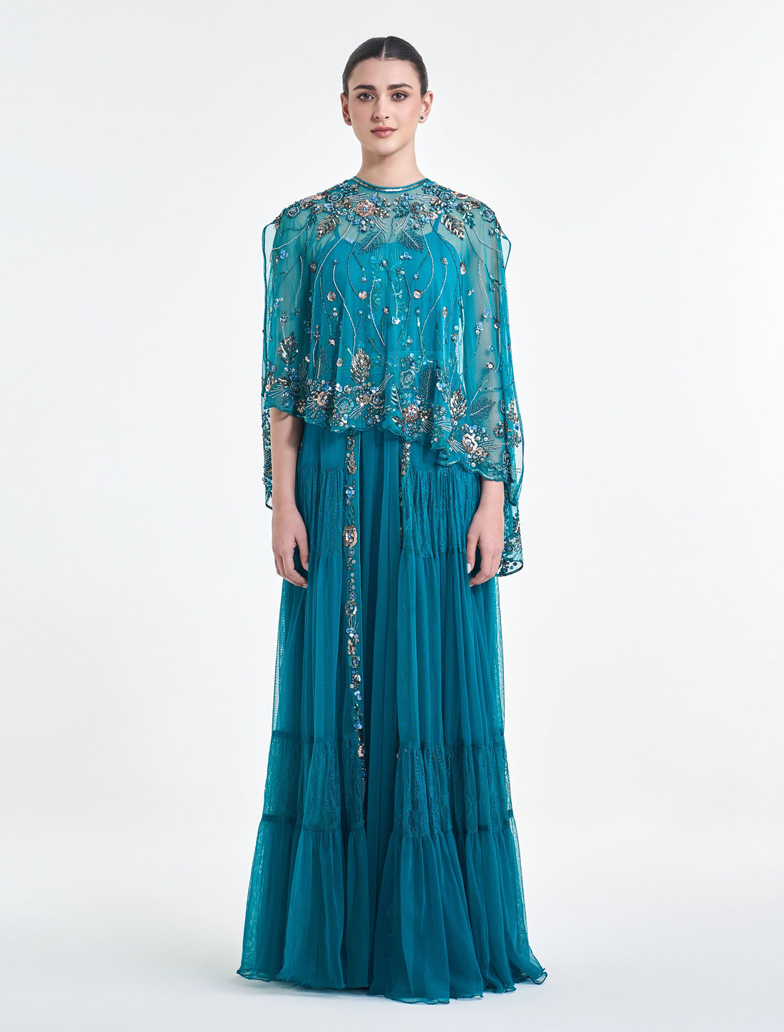فستان لون تركوازي مع بوليرو مطرز
turquoise dress with embroidered bolero