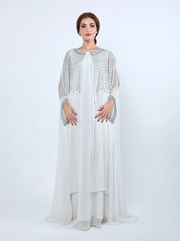 فستان شالكي نسائي لونه ابيض مع كاب مطرز فضي
Shalky Women's dress in white with a cape